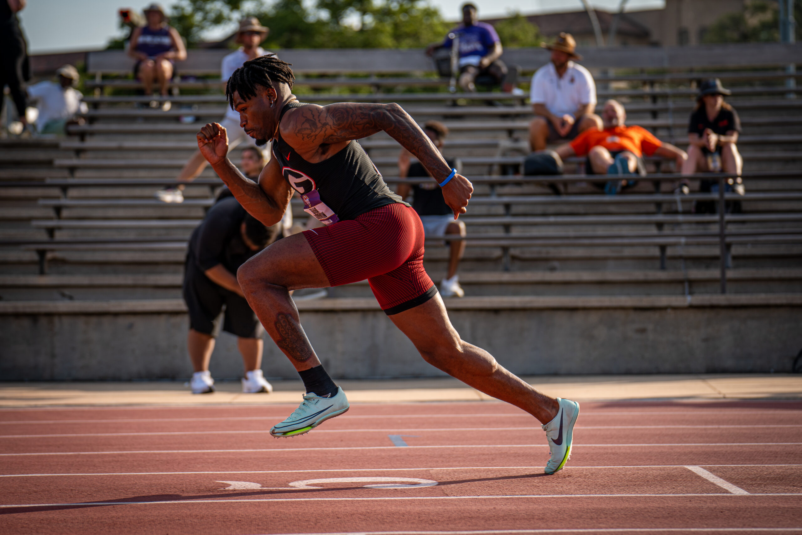 Sprinter accelerating along the track