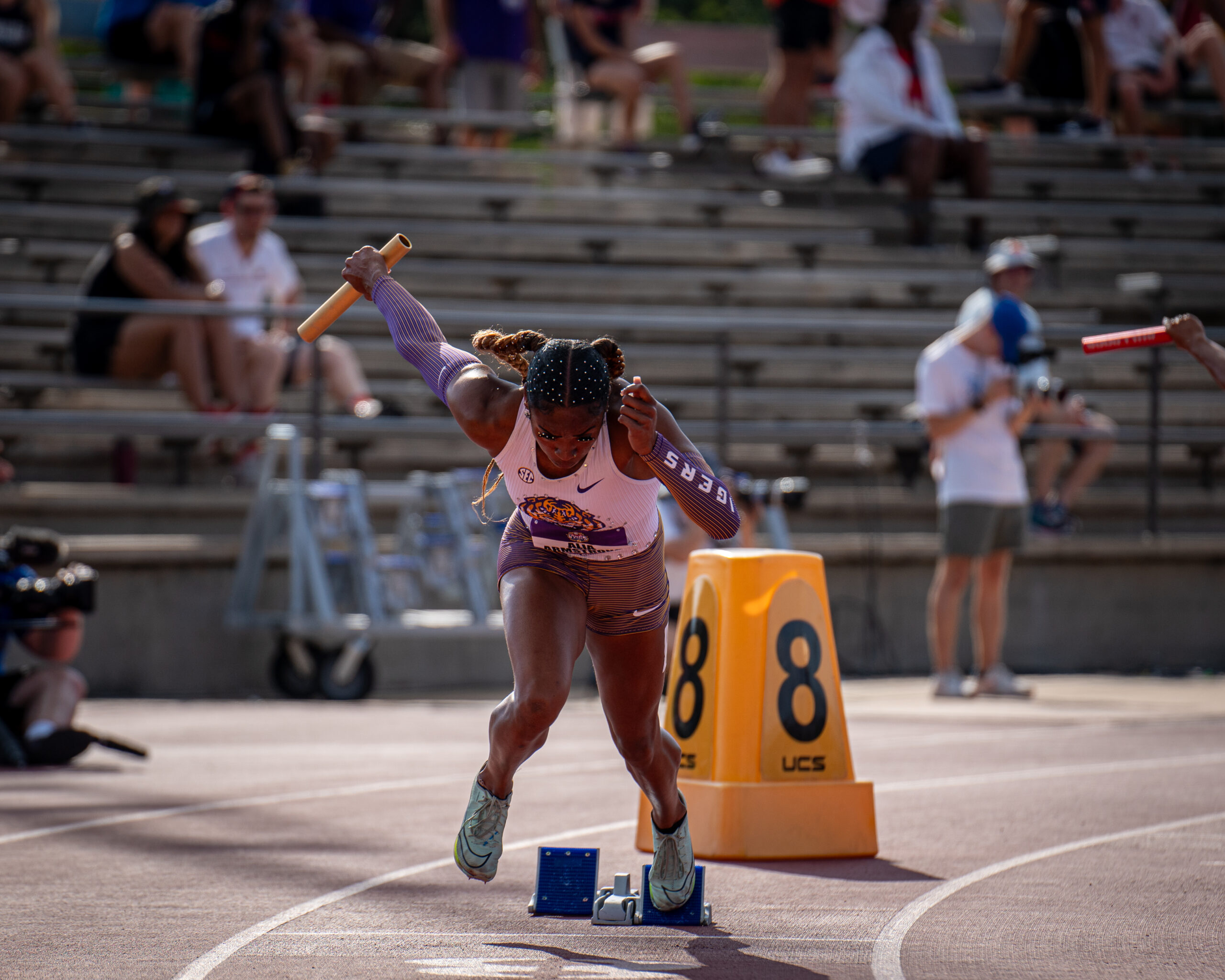Sprinter accelerating from the starting blocks