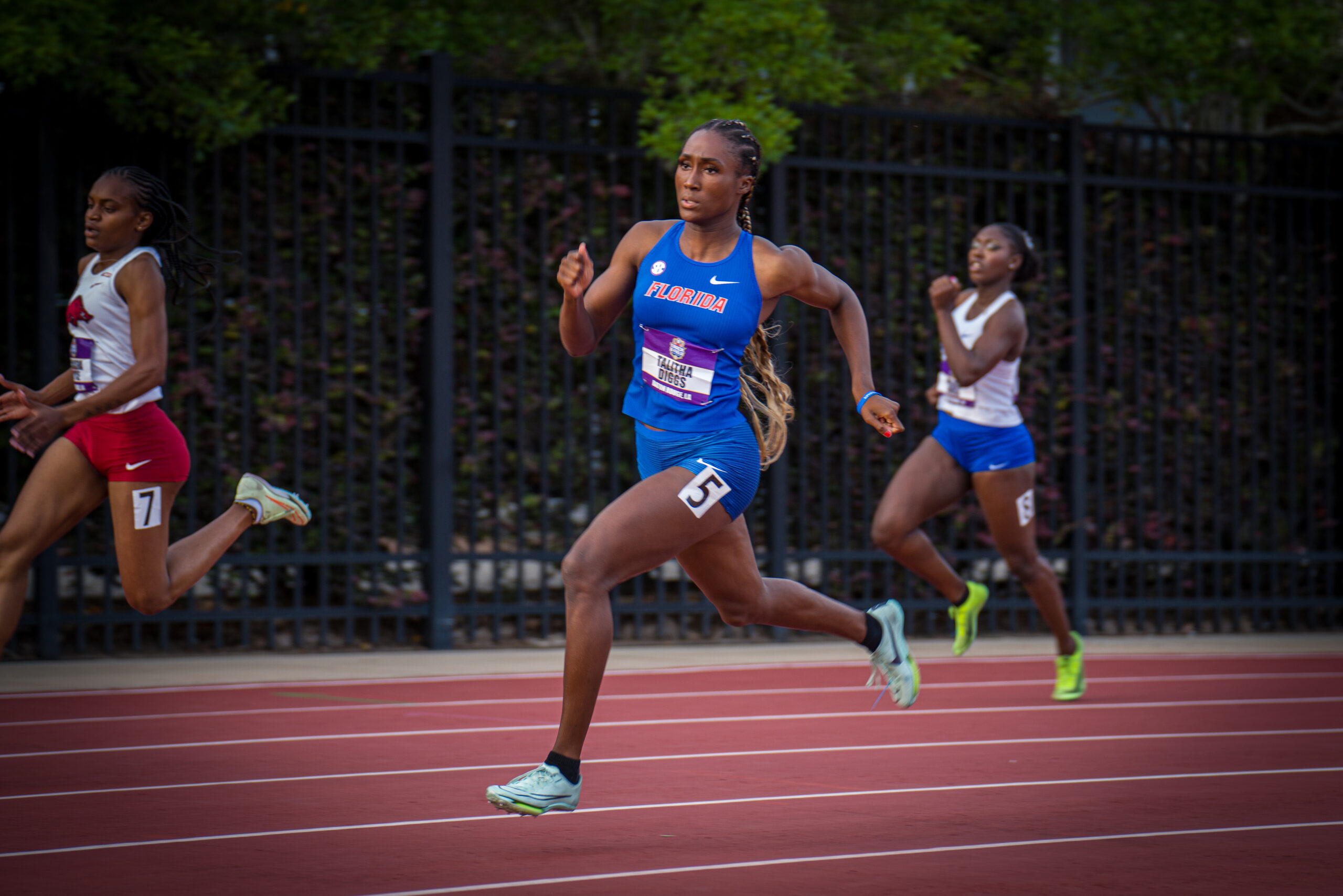 Athletes sprinting during a track race
